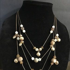 Super gorgeous 4 strands gold tone with beautiful stones and crystals Necklace.